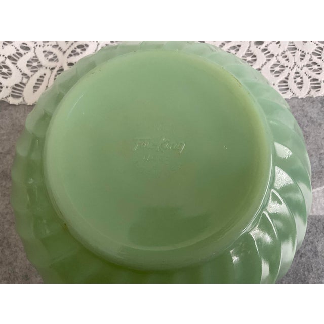 Vintage Jadeite Fire King light green bowl. Measuring 8" diameter x 4" deep. Condition: No chips or Cracks