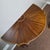 Elegant American Federal demi-lune pier table, circa 1800, crafted in richly figured mahogany and distinguished by an...