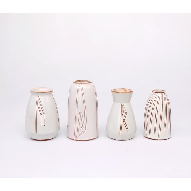 Set of earthenware mini vases, 1960s. The vases are made of earthenware and decorated using the sgraffito technique. The...