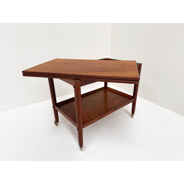This exquisite serving trolley, made by Jeppesen Møbelfabrik in the 1960s, is a perfect example of Scandinavian...