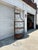 We have a beautiful Drexel Heritage corner etagere for sale. It features wrought iron scrollwork, Tuscan Revival styling,...