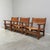 Remarks: Set Spanish arm chairs in brutalist style, 1960s. Solid oak frames with saddle leather seats. Chairs are good...