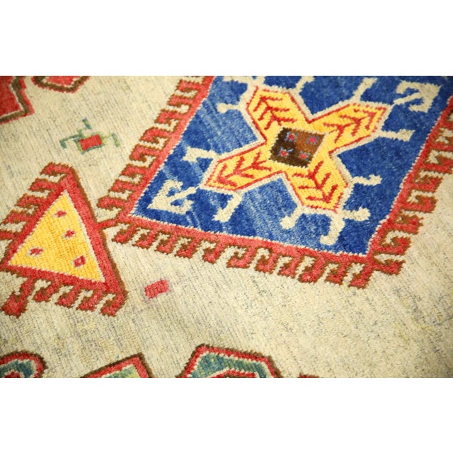 Introducing a one-of-a-kind vintage Turkish hand-knotted wool rug, carefully crafted by skilled artisans using traditional...