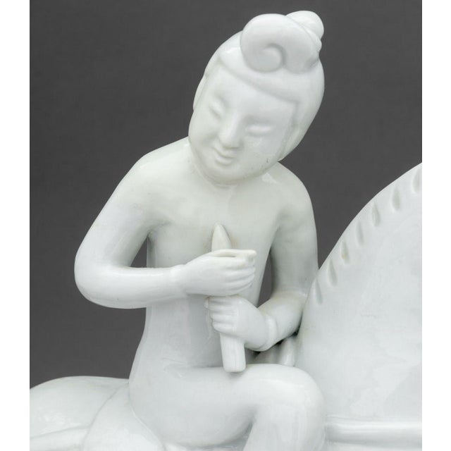Blanc de Chine Figure on Horseback Porcelain Sculpture. 12" H x 12" W x 4.25" D. Provenance: From an East 72nd Street Estate.