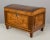 An early 19th century miniature Italian coffer, or hinged box, made of solid walnut with marquetry inlay of various woods...