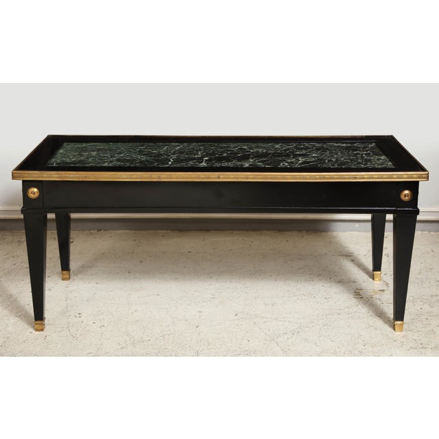 Jansen marble-top coffee table in the Directoire manner.