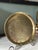 An exquisite mid-century vintage Indian brass oval tray, hand-crafted in the historic metalworking center of Benares...