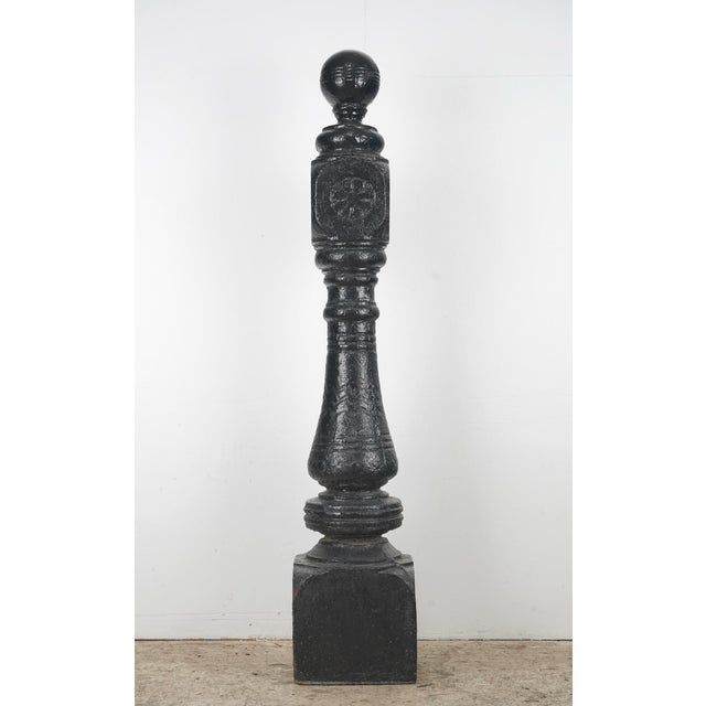 Victorian newel posts made of cast iron with large ball finials and multiple embossed floral rosettes. The finials are not...