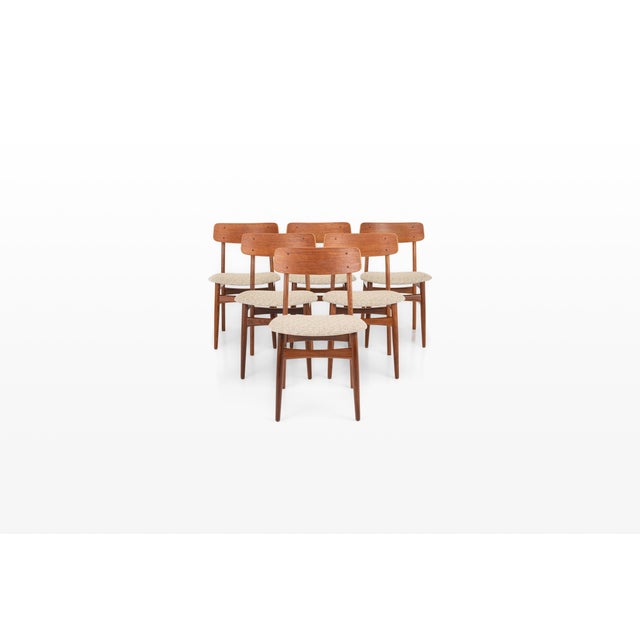 A beautiful set of six danish dining chairs by farstrup, crafted in solid teak with elegant, timeless lines. The chairs...