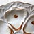 Capture the charm of Victorian-era dining with this antique porcelain oyster plate, dating from circa 1880–1910. This...