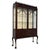 An impressive early 20th-century mahogany display cabinet by Morgan & Co., finely crafted in the Chippendale style and...