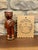 A stunning addition to any premium primitive collection, this standing holiday bear figurine brings early American...