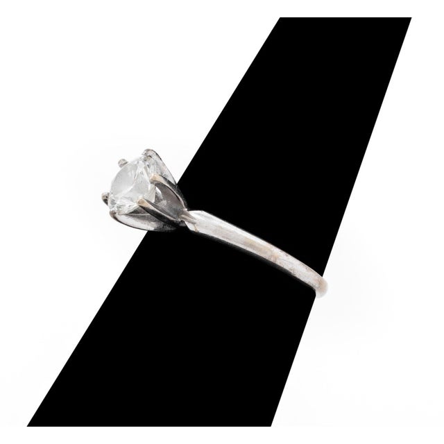 Diamond Solitaire 14K White Gold Ring, featuring one round brilliant cut diamond, I-J color, VS2 clarity, approx. 0.70...