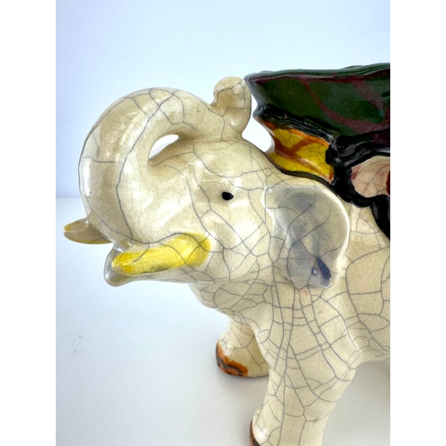 A wonderfully expressive Japanese ceramic elephant planter attributed to Tashiro Shoten, dating to approximately the...