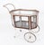 This is a striking and rare antique French Art Deco Gilt and glass bar cart, circa 1920 in date. The cart features an...