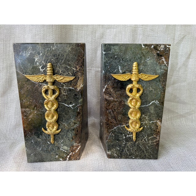 Handsome vintage set of 2, heavy Italian brown and gray marble Caduceus, medical emblem bookends. Tall, thick rectangular...