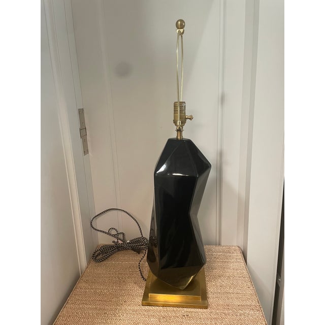 Visual Comfort's Signature Collection, the Bayliss Table Lamp is a striking sculptural statement that blends artisanal...