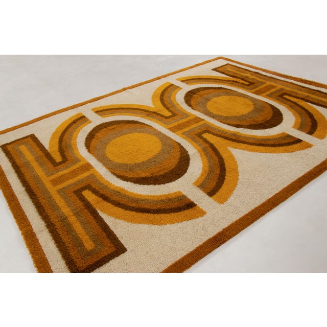 Hand-knotted in premium wool and originating circa 1950-1959, this 8x11 vintage Swedish rug joins Rug & Kilim’s...