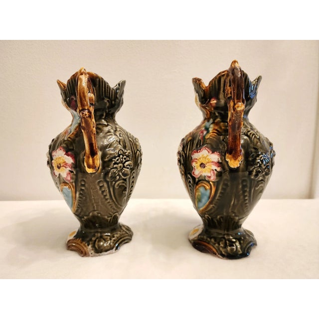 A pair of Antique Majolica Art Nouveau Jugendstil vases. Lovely polychrome baluster shaped vases. These vases enhance and...