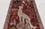Hand-knotted in wool circa 1950-1960, this 3x9 vintage Persian Gabbeh runner is an enchanting entry in Rug & Kilim’s...