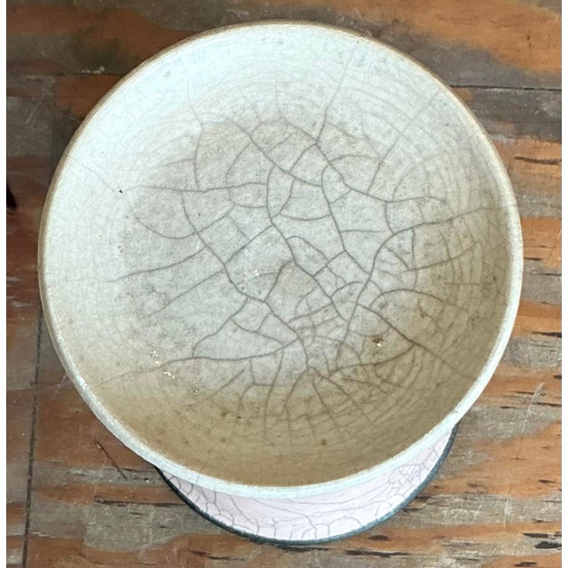 Illuminate your living space with this striking graduated set of three vintage ceramic candle holders. Channeling a...