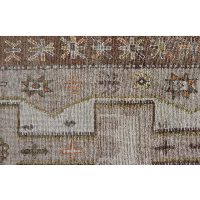 Measures: 6'0" x 10'3" Geometric All-Over Design Gallery Turkish Oushak Rug in Soft Ivory and Taupe. Keivan Woven Arts /...