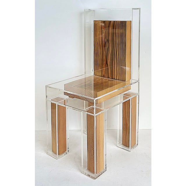 Custom Made Lucite and Wood Sculptural Chair Offered for sale is a custom made Lucite and wood sculptural chair which is...