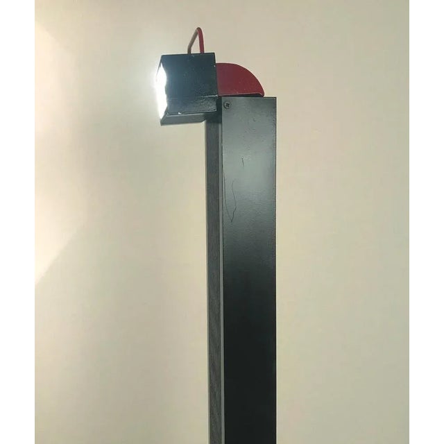 Marvelous mid-century black and red anodized aluminum floor lamp. This wonderful lamp was designed in Italy during 1978 by...