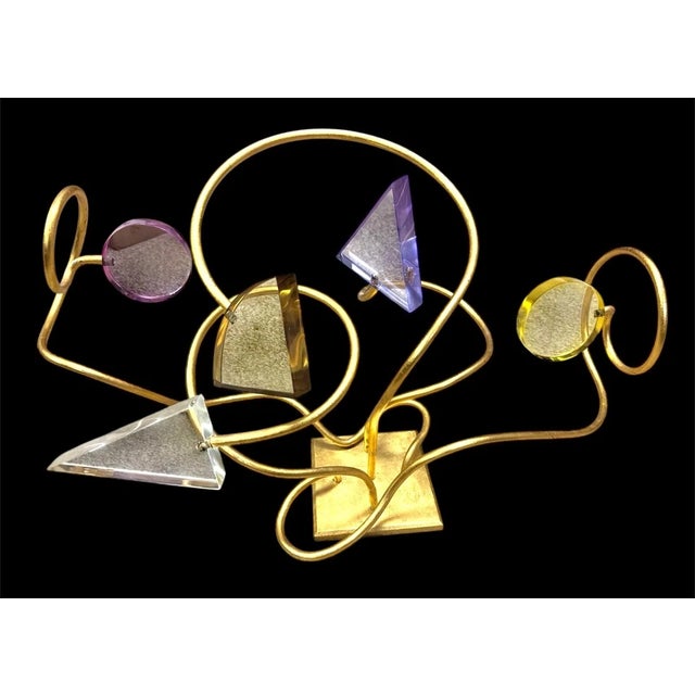 Vintage but Modern Table Sculpture with gold painted arms holding acrylic geometric shapes.
