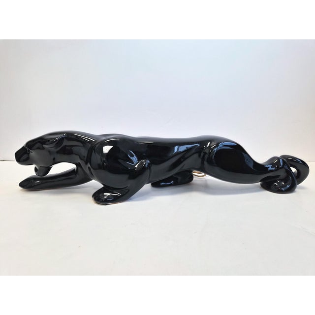 Black panther TV Lamp with an open cutout for diffused backlight. This is a 1950s ~1960s ceramic, high gloss, black glaze...