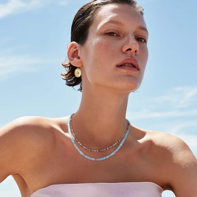 Aquamarine cut into small cubes, unusual for the stone, which is usually faceted or smooth. The shape catches light...