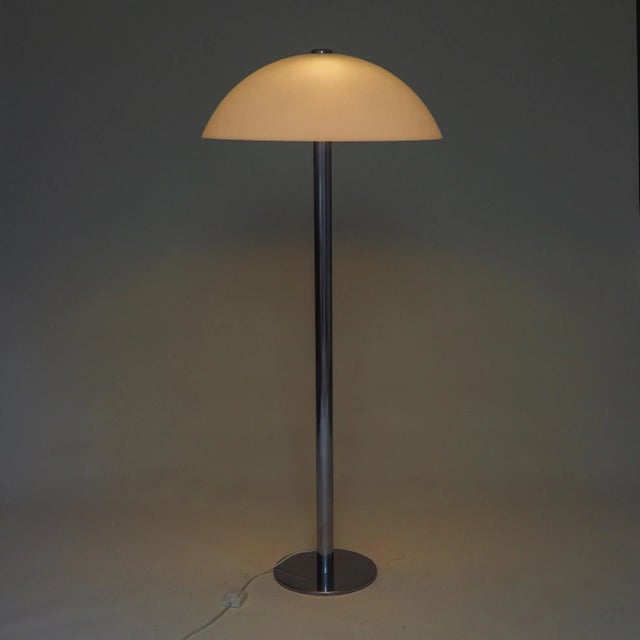Space Age floor lamp designed by Luigi Massoni for Guzzini, Italy, in the 1970s. The design features a distinct "mushroom"...