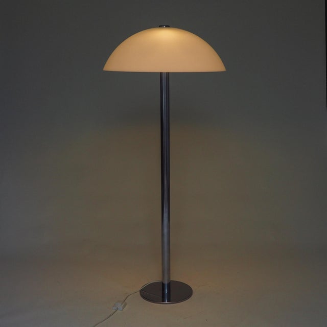 Space Age floor lamp designed by Luigi Massoni for iGuzzini, Italy, in the 1970s. The design features a distinct...