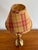 Small brass candlestick lamp with a pretty plaid shade in yellow ochre and red burgundy. Please see condition details...