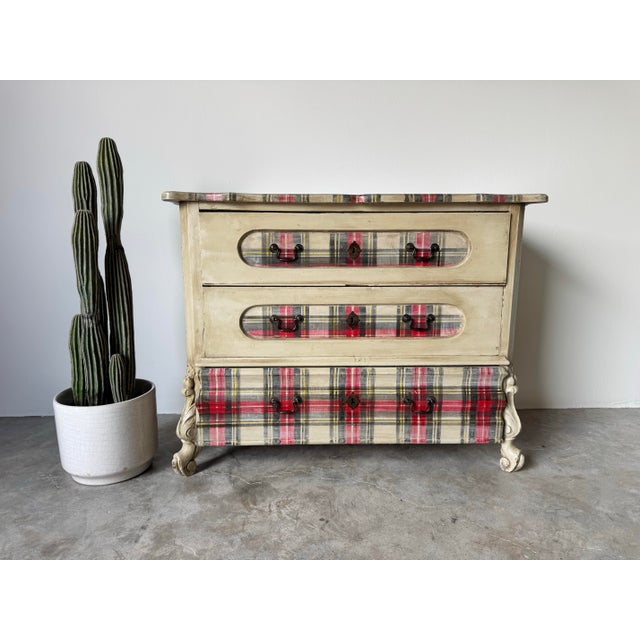 This charming antique French Country farmhouse chest of drawers blends rustic elegance with playful flair. Featuring a...