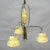 A great Art Deco style chandelier with 3 marbled glass shades on a cromium plated and patinated metal fitting. Patination...