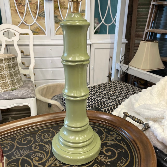 Vintage faux bamboo table lamp in olive green with an unexpected element of printed shade in brown and white geometric...