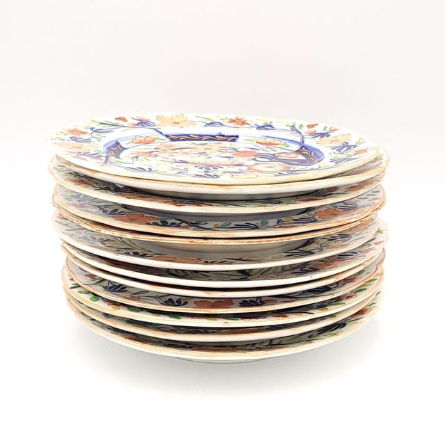 A set of twelve Coalport dinner plates, England circa 1825.