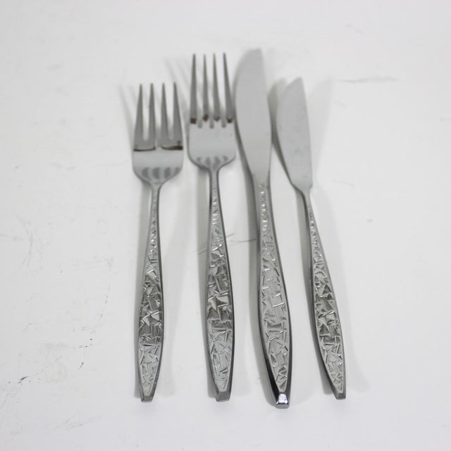 19 pieces of stainless steel Japanese Ekco Eterna Balboa pattern. These are brutalist style with a shiny geometric pattern...