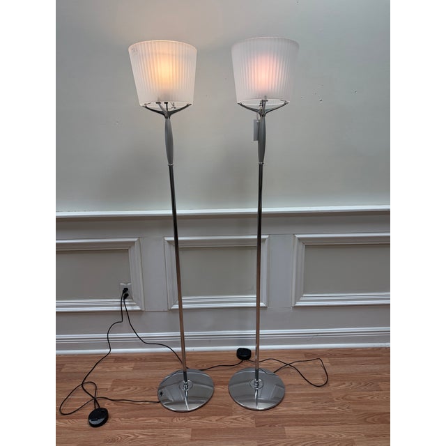 This set offers a chrome contemporary base with original frosted glass shades. Both have a dimmer option and are working...