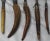 We are offering an antique horn handled carving set with five pieces. The set features a honing blade, carving knife, two...