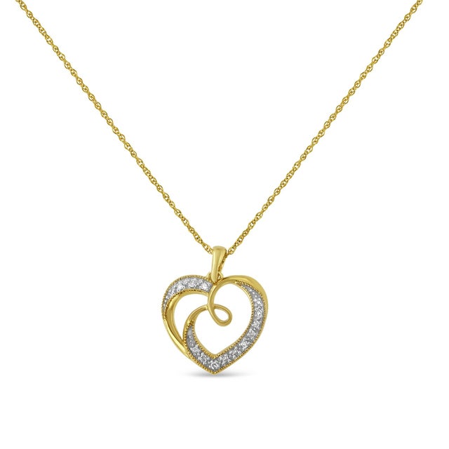 Show that someone special how much you love them with this beautiful, gold tone diamond heart pendant necklace. This piece...