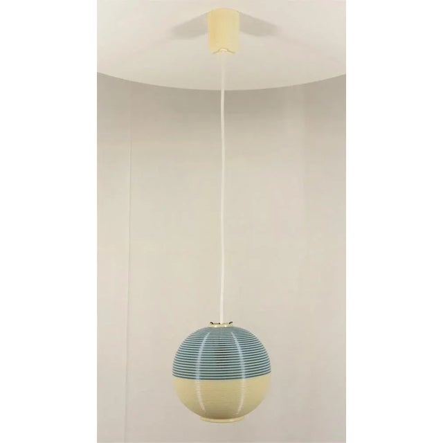 Globe suspension of A.R.P by Rotaflex 1950. Bicolor blue and colorful white globe. Opaque and translucent color effect....