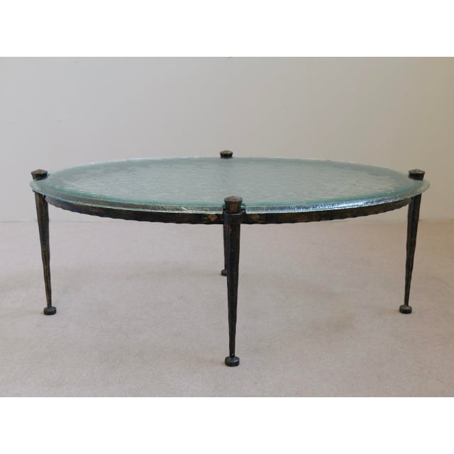 Oval Forged Table with Blue Glass Top in the style of Lothar Klute, in Flawless conditions. Designed 1980 to 1989 This...