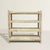 Some pieces whisper; this one practically disappears, and does so with intention. This late 20th-century French bookshelf...
