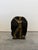 Modern sculpture of female torso carved from a round piece of bronze on bronze base. Signed by unknown artist circa 1980s.