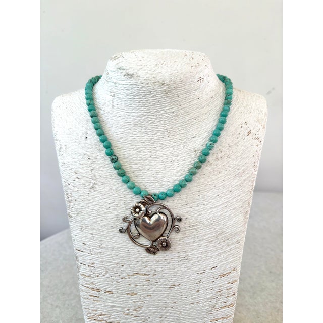 Lovely turquoise necklace with sterling silver vintage pendant.