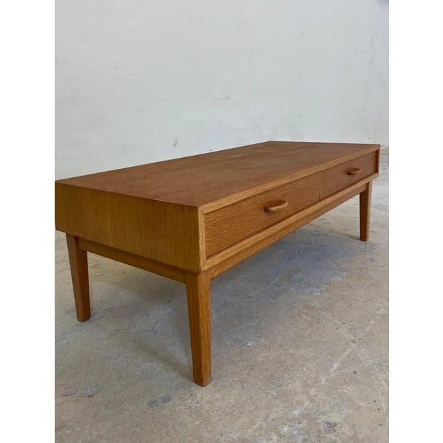 This small, elegant oak lowboard is a wonderful design treasure from Sweden, embodying the timeless, minimalist charm of...