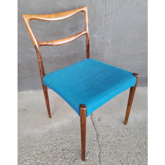 Minimalist design in this set of 6 rosewood Danish Modern dining chairs. Designed by H. W. Klein for Bramin. Made in...