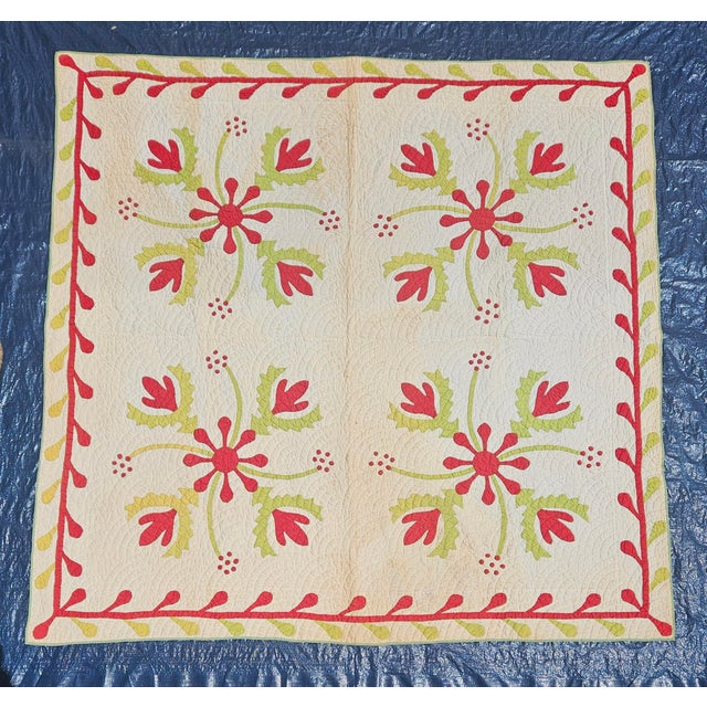 This antique-style mid-19th century red and green floral applique quilt is a gorgeous example of the classic color...